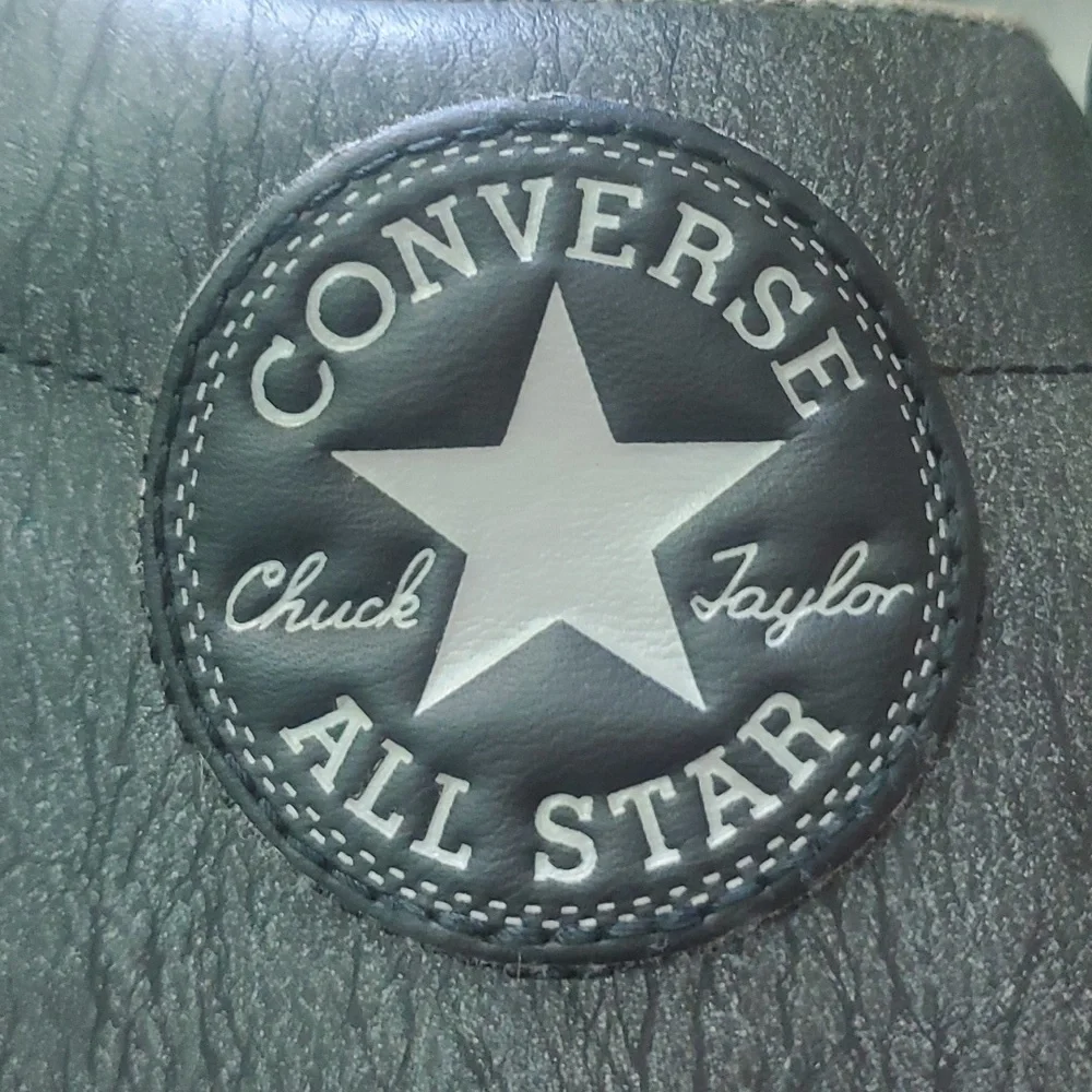 Converse Chuck Taylor leather low tops